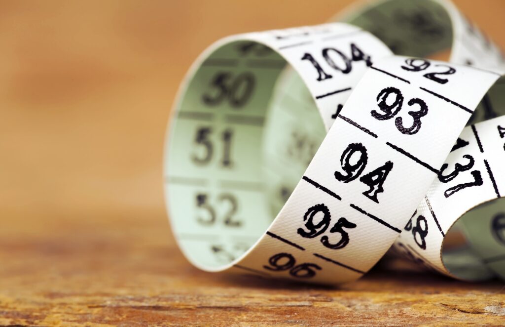 weight loss diet measuring tape close up 2023 11 27 04 58 20 utc 1